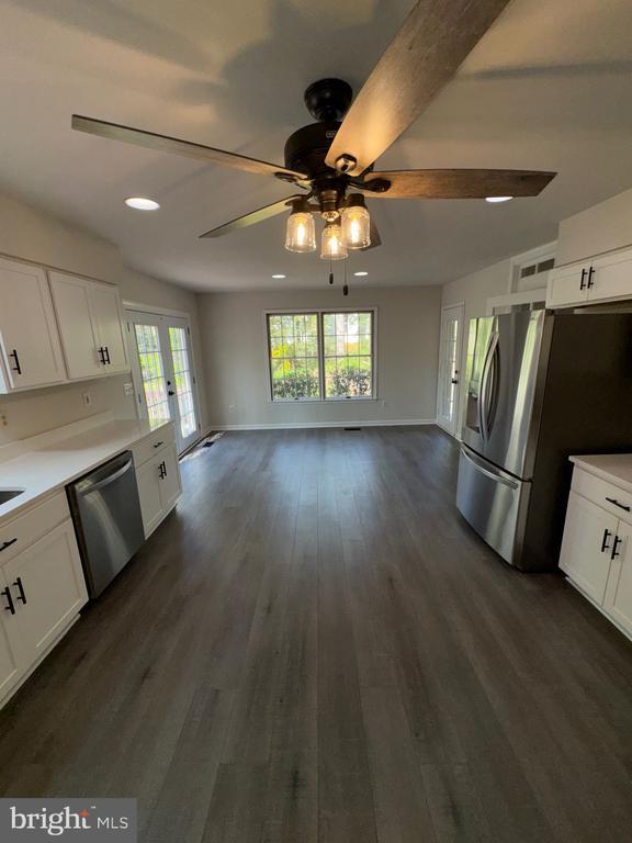 12704 Getty Ln, Spotsylvania, VA 22551 - kitchen with appliances with stainless steel finishes, ceiling fan, plenty of natural light, french doors, and recessed lighting