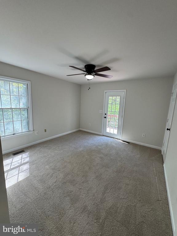 12704 Getty Ln, Spotsylvania, VA 22551 - unfurnished room with a ceiling fan and carpet flooring