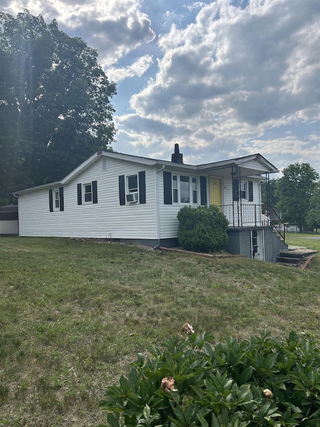 125 Mccutchen School Ln, Goshen, VA 24439 - view of front facade featuring a front yard, a chimney, and cooling unit
