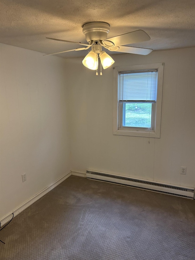 125 Mccutchen School Ln, Goshen, VA 24439 - unfurnished room featuring a baseboard heating unit, dark carpet, a textured ceiling, and ceiling fan