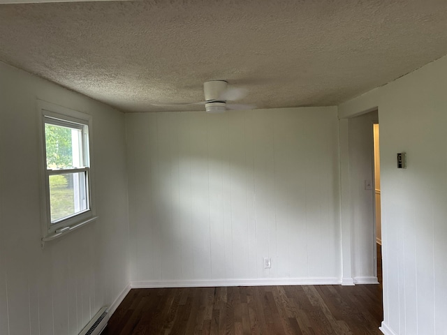 125 Mccutchen School Ln, Goshen, VA 24439 - empty room featuring dark wood finished floors, a ceiling fan, and a textured ceiling