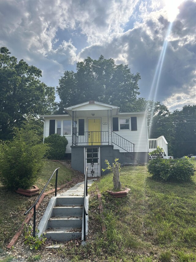125 Mccutchen School Ln, Goshen, VA 24439 - view of front of home featuring stairway, a front yard, and french doors