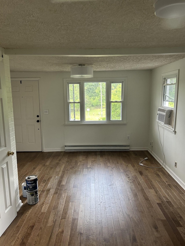 125 Mccutchen School Ln, Goshen, VA 24439 - empty room featuring a baseboard radiator, dark wood finished floors, a textured ceiling, healthy amount of natural light, and cooling unit