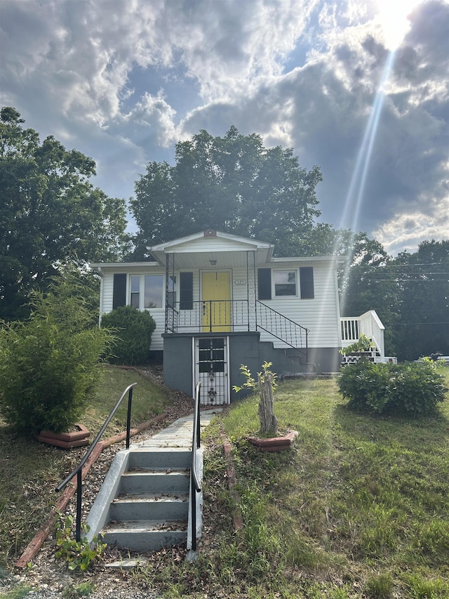 125 Mccutchen School Ln, Goshen, VA 24439 - view of front of property with stairway, a front lawn, and french doors