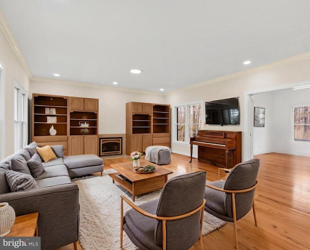  - living room with ornamental molding, light wood-style floors, and recessed lighting