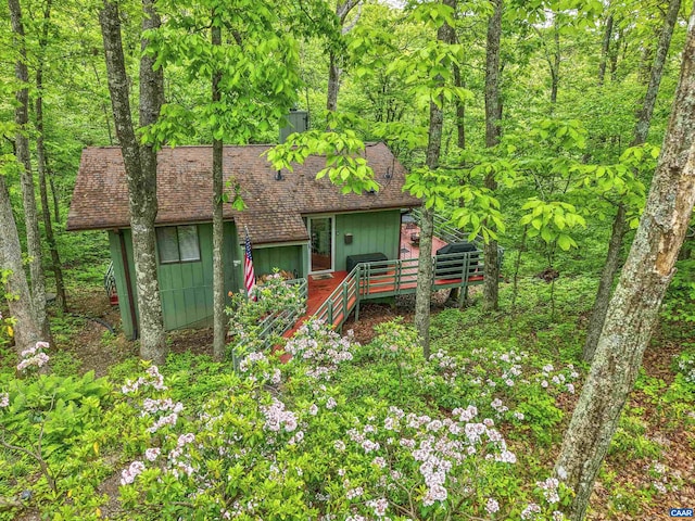 134 Gumtree Dr, Wintergreen Resort, VA 22967 - view of front facade featuring a shingled roof and a deck