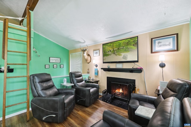 134 Gumtree Dr, Wintergreen Resort, VA 22967 - living room with wood finished floors, vaulted ceiling, a fireplace with flush hearth, ornamental molding, and baseboards
