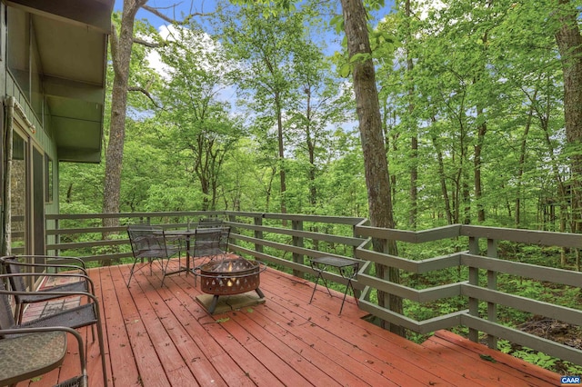 134 Gumtree Dr, Wintergreen Resort, VA 22967 - wooden terrace featuring a fire pit