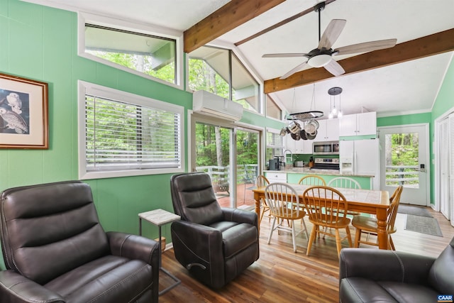 134 Gumtree Dr, Wintergreen Resort, VA 22967 - living area featuring a wall unit AC, wood finished floors, and a ceiling fan