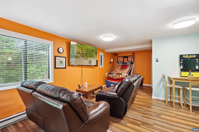 134 Gumtree Dr, Wintergreen Resort, VA 22967 - living room featuring a baseboard radiator, wood finished floors, and baseboards