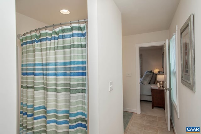 814 Cole St, Charlottesville, VA 22901 - full bath with tile patterned flooring, connected bathroom, recessed lighting, baseboards, and curtained shower