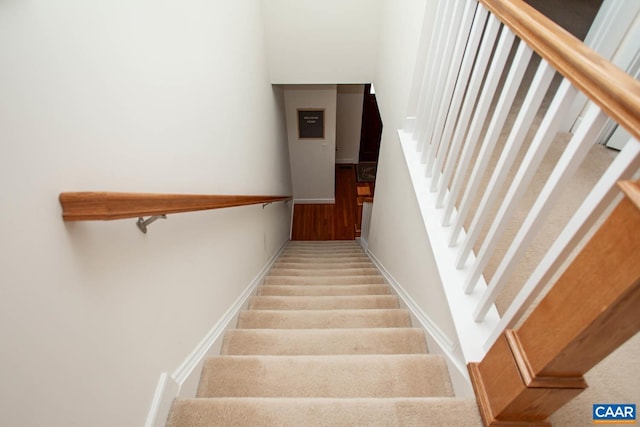 814 Cole St, Charlottesville, VA 22901 - staircase with baseboards and carpet floors