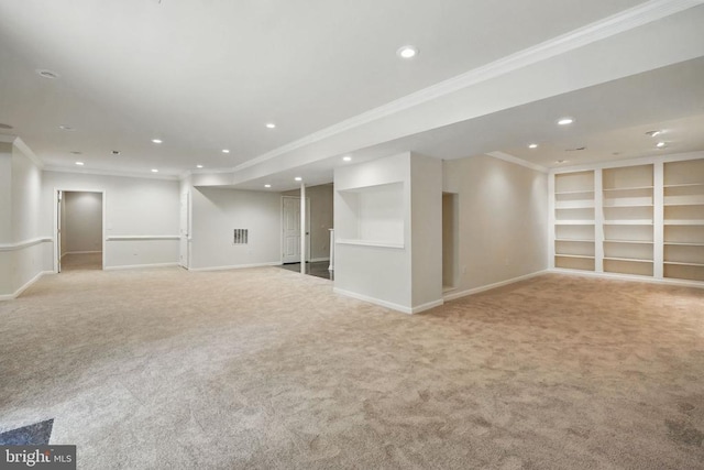 11402 Chivalry Chase Ln, Spotsylvania, VA 22551 - finished below grade area with carpet floors, crown molding, recessed lighting, baseboards, and built in shelves