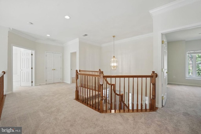 11402 Chivalry Chase Ln, Spotsylvania, VA 22551 - corridor featuring an upstairs landing, carpet flooring, baseboards, crown molding, and a chandelier