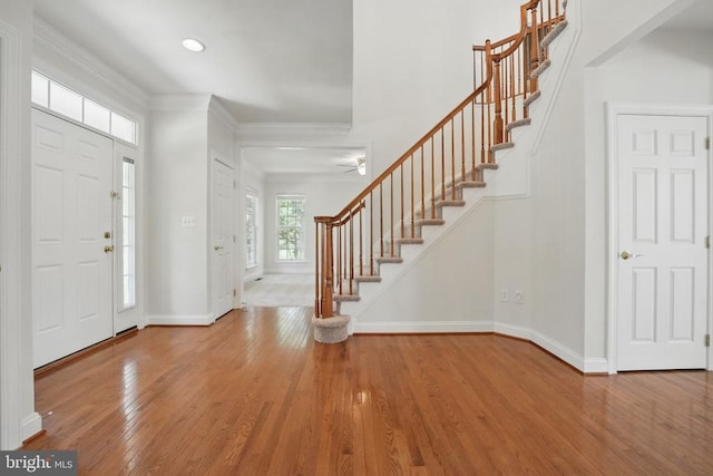 11402 Chivalry Chase Ln, Spotsylvania, VA 22551 - foyer with stairs, wood finished floors, baseboards, recessed lighting, and ornamental molding