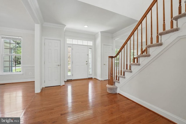 11402 Chivalry Chase Ln, Spotsylvania, VA 22551 - foyer featuring wood finished floors, crown molding, stairs, and baseboards