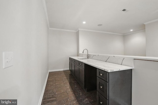 11402 Chivalry Chase Ln, Spotsylvania, VA 22551 - kitchen featuring crown molding, a sink, baseboards, recessed lighting, and light stone counters