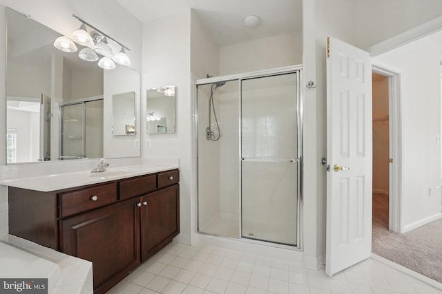 11402 Chivalry Chase Ln, Spotsylvania, VA 22551 - bathroom with a stall shower, vanity, and baseboards