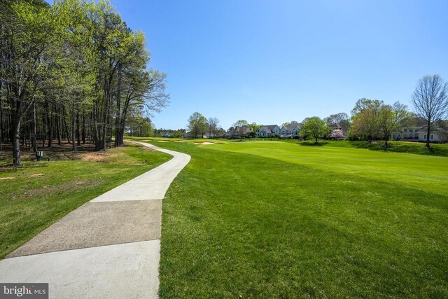 11402 Chivalry Chase Ln, Spotsylvania, VA 22551 - view of community with a yard and a residential view