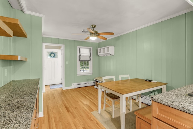 406 College Cir, Staunton, VA 24401 - dining space with baseboard heating, ornamental molding, ceiling fan, and light wood finished floors