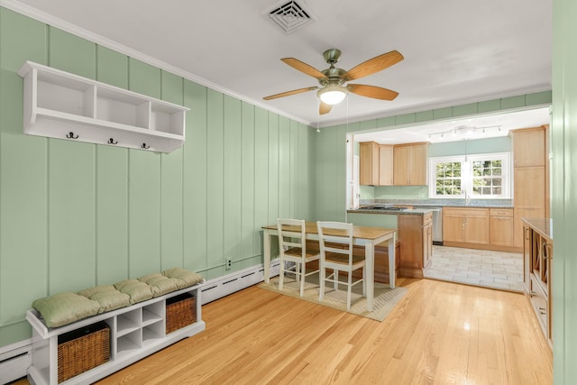 406 College Cir, Staunton, VA 24401 - kitchen with a baseboard radiator, light wood-type flooring, light brown cabinets, ceiling fan, and ornamental molding