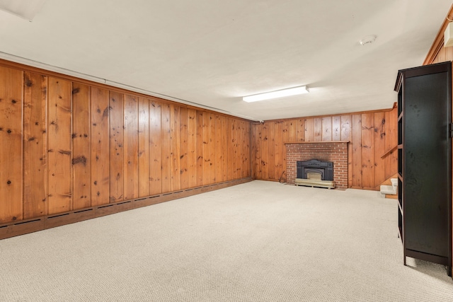 406 College Cir, Staunton, VA 24401 - unfurnished living room with light carpet, wood walls, and a brick fireplace