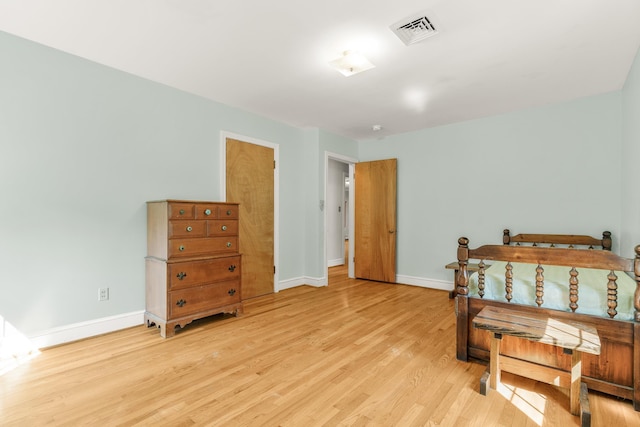 406 College Cir, Staunton, VA 24401 - bedroom featuring baseboards and light wood-style flooring