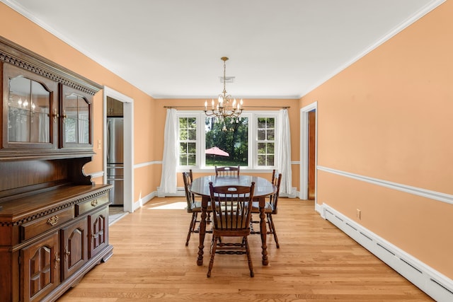 406 College Cir, Staunton, VA 24401 - dining space with baseboard heating, a chandelier, light wood finished floors, and ornamental molding