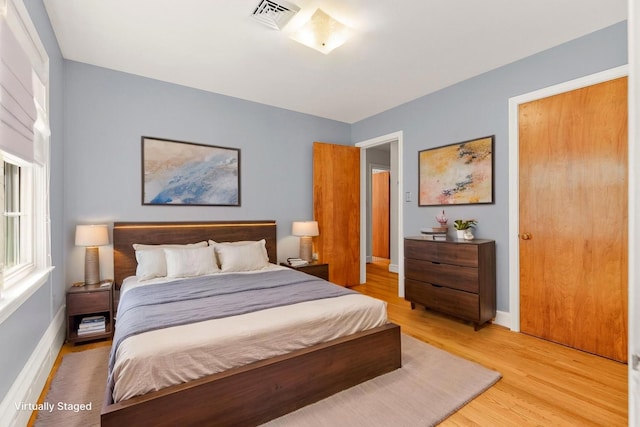406 College Cir, Staunton, VA 24401 - bedroom featuring light wood finished floors and baseboards