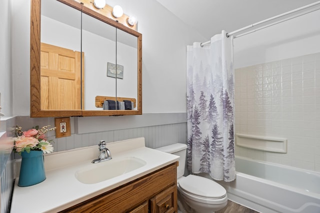 1215 Fort Stover Rd, Luray, VA 22835 - full bathroom with vanity, shower / bath combo with shower curtain, and wainscoting
