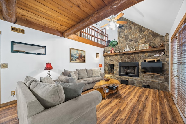 1215 Fort Stover Rd, Luray, VA 22835 - living room featuring a ceiling fan, wood finished floors, and a stone fireplace
