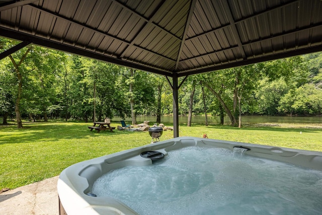 1215 Fort Stover Rd, Luray, VA 22835 - view of patio featuring a hot tub and a water view