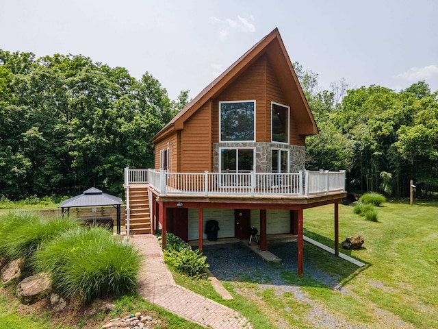 1215 Fort Stover Rd, Luray, VA 22835 - back of house featuring stairway, driveway, a deck, and a lawn