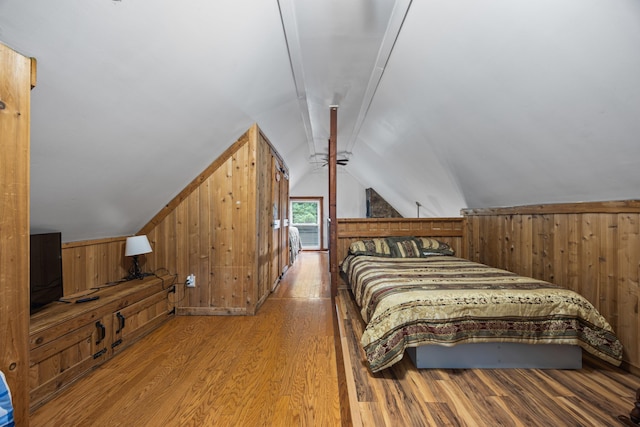 1215 Fort Stover Rd, Luray, VA 22835 - bedroom featuring wood walls, vaulted ceiling, and wood finished floors