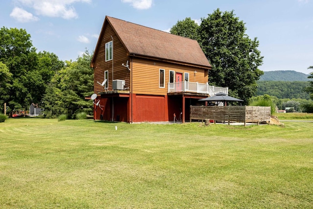 1215 Fort Stover Rd, Luray, VA 22835 - rear view of house with a gazebo, a yard, and roof with shingles