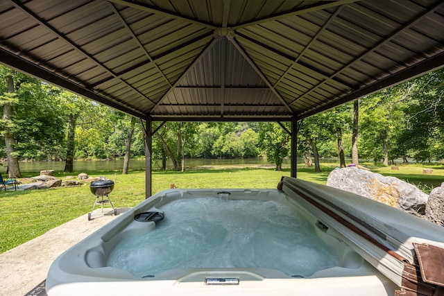1215 Fort Stover Rd, Luray, VA 22835 - view of patio featuring a hot tub, view of wooded area, and a gazebo