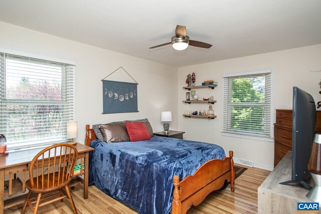 2750 Meriwether Dr, Charlottesville, VA 22901 - bedroom with light wood-type flooring, a desk, baseboards, and ceiling fan