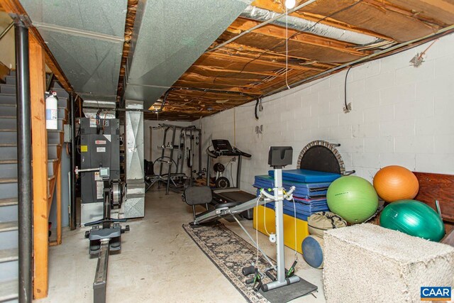 2750 Meriwether Dr, Charlottesville, VA 22901 - exercise room with heating unit and concrete block wall