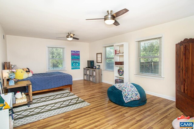 2750 Meriwether Dr, Charlottesville, VA 22901 - bedroom with wood finished floors, baseboards, and a ceiling fan