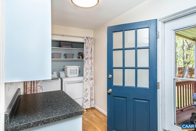2750 Meriwether Dr, Charlottesville, VA 22901 - washroom featuring separate washer and dryer, light wood finished floors, and baseboards