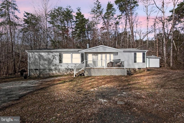 197 Holly Grove Ct, Bumpass, VA 23024 - manufactured / mobile home with crawl space and view of wooded area