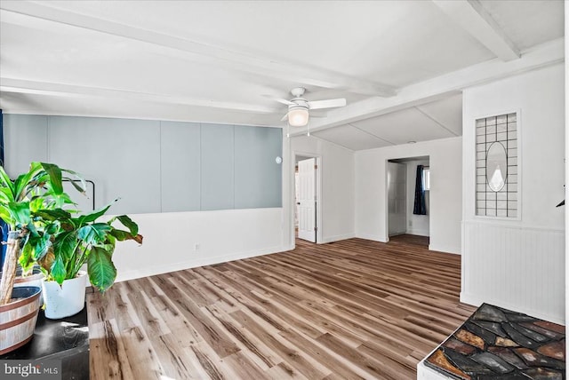 197 Holly Grove Ct, Bumpass, VA 23024 - unfurnished living room featuring wood finished floors, a ceiling fan, and baseboards