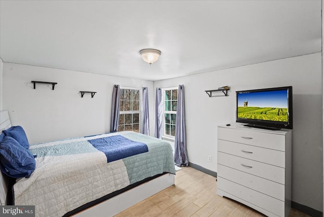 197 Holly Grove Ct, Bumpass, VA 23024 - bedroom featuring light wood-style floors and baseboards