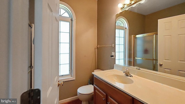 35326 Gosling Ln, Locust Grove, VA 22508 - full bath featuring vanity, plenty of natural light, toilet, and a shower with door