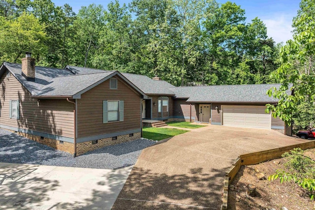 115 Pheasant Rd, Mcgaheysville, VA 22840 - view of front facade with crawl space, concrete driveway, roof with shingles, a garage, and a chimney