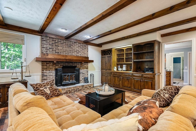 115 Pheasant Rd, Mcgaheysville, VA 22840 - living area featuring light wood-type flooring, beamed ceiling, and a brick fireplace