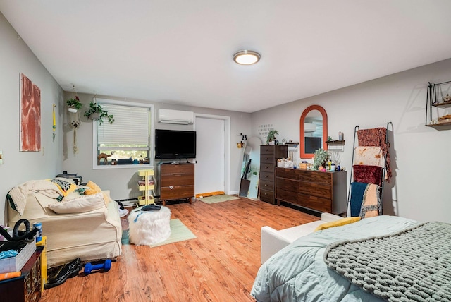 115 Pheasant Rd, Mcgaheysville, VA 22840 - bedroom featuring a wall unit AC and wood finished floors