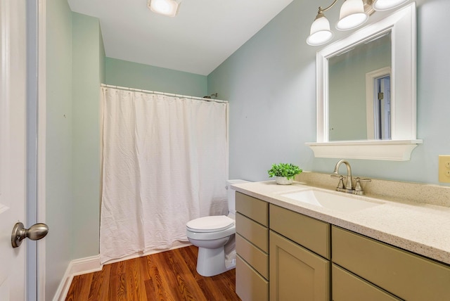 2554 Village Dr, Waynesboro, VA 22980 - full bath featuring wood finished floors, vanity, and curtained shower