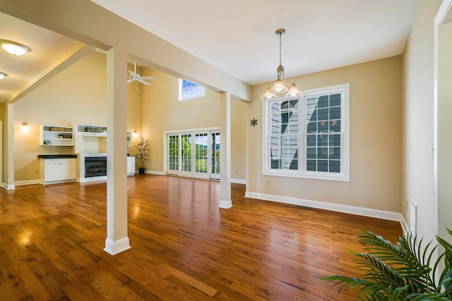 2554 Village Dr, Waynesboro, VA 22980 - unfurnished living room with ceiling fan, wood finished floors, and a fireplace