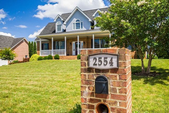 2554 Village Dr, Waynesboro, VA 22980 - view of front facade featuring brick siding and a front lawn